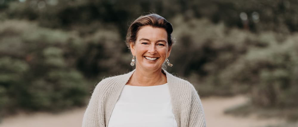 Foto van een glimlachende vrouw tijdens een Personal Branding shoot